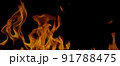 Fire Flames Igniting And Burning, Fiery orange glowing. Abstract background on the theme of fire. Real flames ignite. Royalty high-quality free stock image of overlay flames isolated on black backgrou 91788475