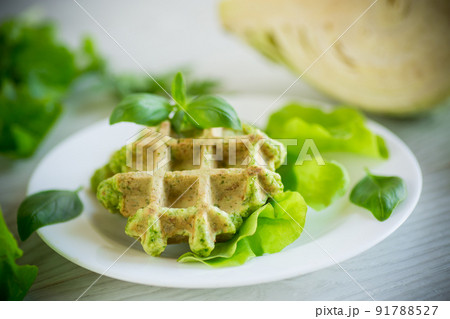 vegetable waffles cooked with herbs in a plate vegetable waffles cooked with herbs in a plate 91788527