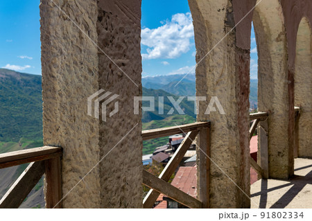 arched gallery along the facade of the house in the ancient mountain village of Chokh in Dagestan 91802334