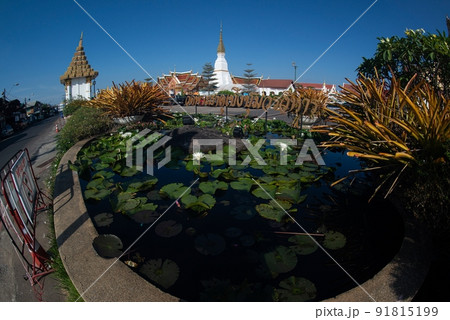Large white pagoda in Wat Phra That Choeng Chum Worawihan It is an important sacred place of the city since ancient times and built in the heart of the Thailand. 91815199