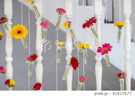 DIY beautiful flower in the little transperance glass and plastic bottle hang on to the stair terrace. 91817677
