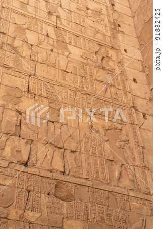 Wall of hieroglyphs in Karnak temple. Egypt. 91832425