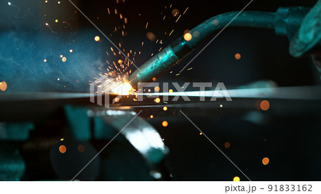 Welder welding technical steel, detail shot. 91833162