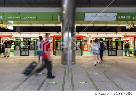 Taichung City, Taiwan - July 3, 2022 : Taichung MRT Metro system. Subway passengers waiting in Green line HSR Taichung station platform. 91837080