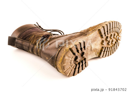 dirty military style light ankle boot isolated on white background 91843702