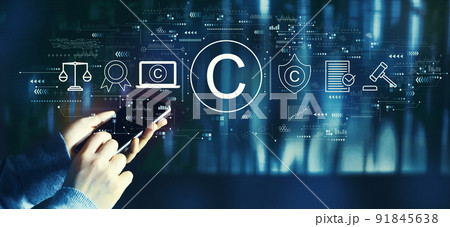 Copyright concept with person using smartphone 91845638