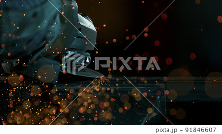 Working Metal Cutter in Workshop. Detail shot, low depth of focus. 91846607