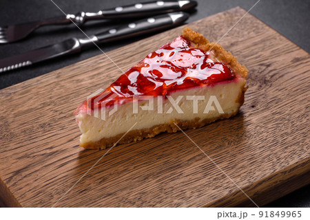 Delicious strawberry tart on concrete background, top view, copy space Delicious strawberry tart on concrete background, top view, copy space 91849965