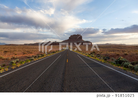 Scenic Road in the Desert with Red Rocky Mountains. Scenic Road in the Desert with Red Rocky Mountains. 91851025