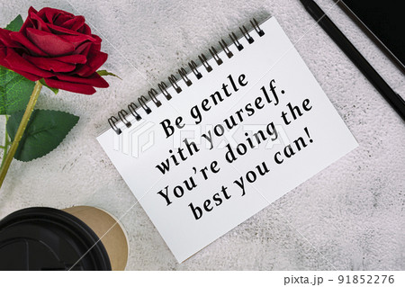 Motivational and inspirational quote on a note book on white marble table. Motivational and inspirational quote on a note book on white marble table. 91852276