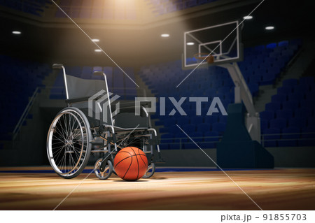 Wheel chaiir with basketball ball on empty basketball arena. Motivation, problems and dreams of disabled person concept. 91855703