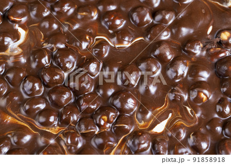homemade chocolate with lots of hazelnuts homemade chocolate with lots of hazelnuts 91858918