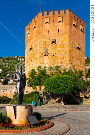 Red Tower and the fortification wall of a medieval castle in Turkish city of Alanya 91862001
