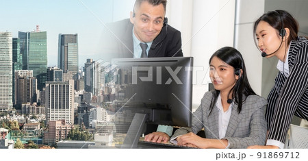 Business people wearing headset working in office broaden view Business people wearing headset working in office broaden view 91869712