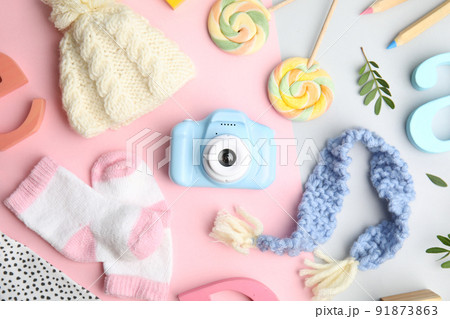 Flat lay composition with toy camera on color background. Future photographer Flat lay composition with toy camera on color background. Future photographer 91873863