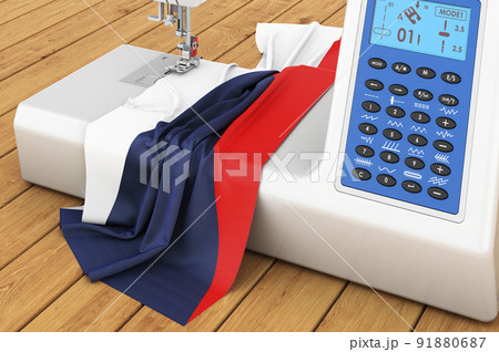 Sewing machine with Czech flag on the wooden table. 3D rendering Sewing machine with Czech flag on the wooden table. 3D rendering 91880687