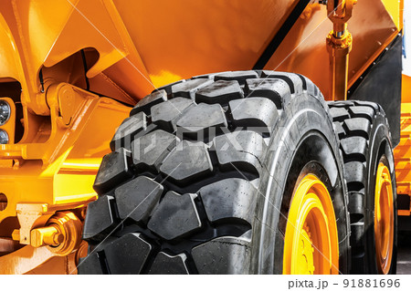 The protector of a large rubber wheel. Rubber tire from the tipper, tractor, bulldozer 91881696