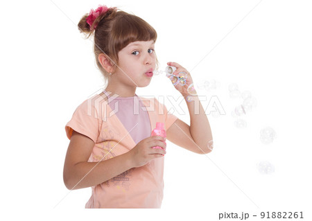 Beautiful little girl with white copy space on a white background Beautiful little girl with white copy space on a white background 91882261