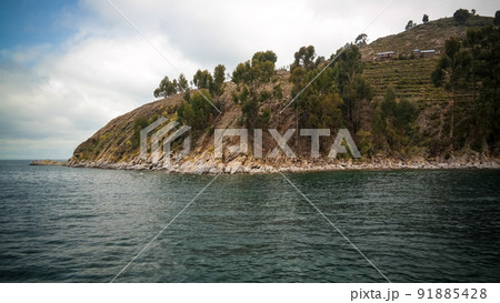 Panoramic view to Taquile island coastline at Titicaca lake, Pun Panoramic view to Taquile island coastline at Titicaca lake, Pun 91885428