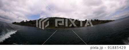 Panoramic view to Taquile island coastline at Titicaca lake, Puno, Peru Panoramic view to Taquile island coastline at Titicaca lake, Puno, Peru 91885429