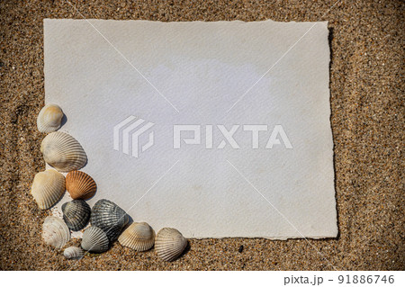 Summer style with empty blank paper card on a sea sand. summer card background for add text Summer style with empty blank paper card on a sea sand. summer card background for add text 91886746