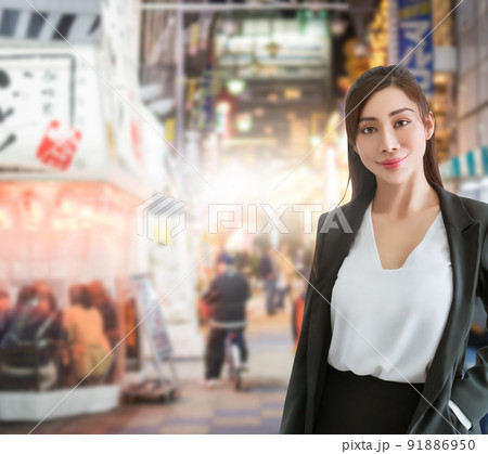 Portrait of an Asian Business woman with Japanese Tokyo Shop and restaurant city area background. 91886950