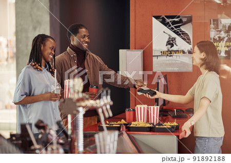 Couple having a date at cinema 91892188