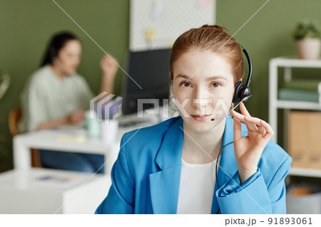 Call centre operator in headphones Call centre operator in headphones 91893061