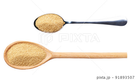 wooden and metal spoon with amaranth isolated on white background top view. 91893507