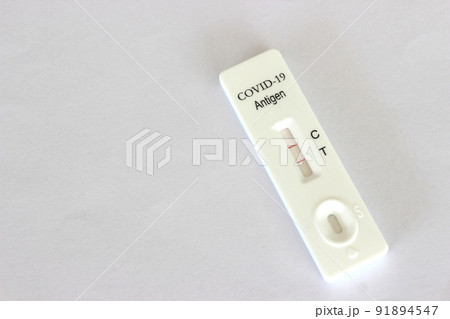 Positive test result of Covid-19 antigen test kit on the white background 91894547