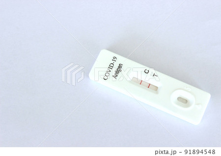 Positive test result of Covid-19 antigen test kit on the white background 91894548