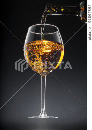 Glass of wine on black background, close up Glass of wine on black background, close up 91897396