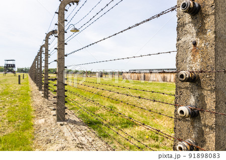 Barbed wire around the Auschwitz-Birkenau concentration camp. Oswiecim, Poland, 16 May 2022 91898083