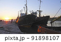 Old abandoned fishing boat at sunset 91898107