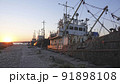 Old abandoned fishing boat at sunset 91898108