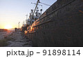 Old abandoned fishing boat at sunset 91898114