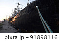 Old abandoned fishing boat at sunset 91898116