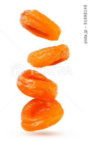 Dried apricots flies on a white background. Isolated Dried apricots flies on a white background. Isolated 91898149