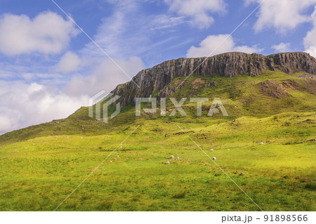 view on view on mountain ridge from Duntulm castle, Isle of Skye, Scotland view on view on mountain ridge from Duntulm castle, Isle of Skye, Scotland 91898566