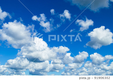 Beautiful summer blue sky. Fluffy white cumulus clouds. Beautiful summer blue sky. Fluffy white cumulus clouds. 91906302
