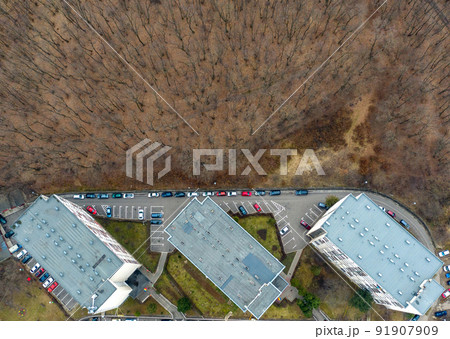 Aerial view of urban environment, city taking place of nature 91907909