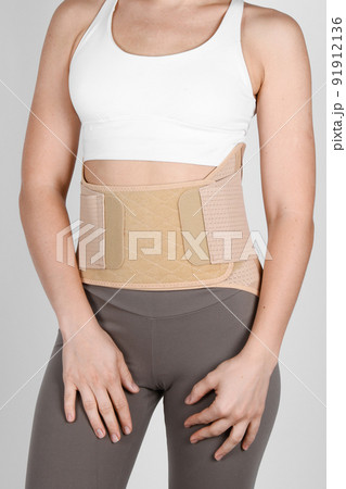 Orthopedic lumbar corset on the human body. - Stock Photo [91912136] -  PIXTA