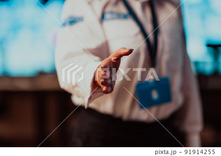 Close up photo of a female hand working in a security center. Concept of client support 91914255