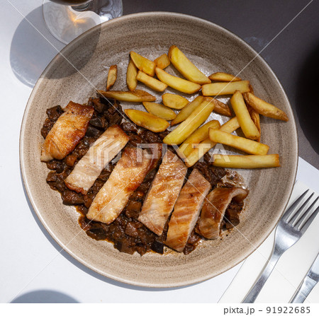 Spanish secreto iberico - iberian pork in sweet wine with stewed vegetables Spanish secreto iberico - iberian pork in sweet wine with stewed vegetables 91922685