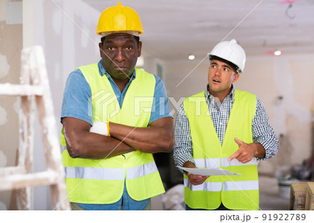 Head of construction is dissatisfied with work done by builder Head of construction is dissatisfied with work done by builder 91922789