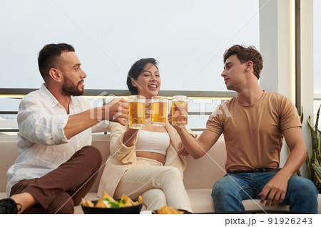 Friends Celebrating Something in Rooftop Bar Friends Celebrating Something in Rooftop Bar 91926243