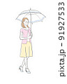 海辺で日傘を持つ女性 91927533