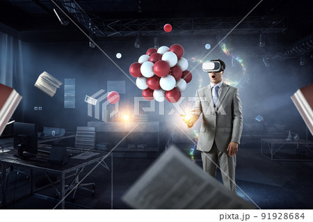 Man wearing virtual reality goggles Man wearing virtual reality goggles 91928684