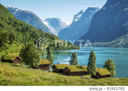 Panorama of norwegian landscape with traditional farm village 91931762