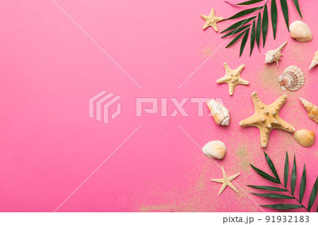 Summer time concept Flat lay composition with beautiful starfish and sea shells on colored table, top view with copy space for text Summer time concept Flat lay composition with beautiful starfish and sea shells on colored table, top view with copy space for text 91932183